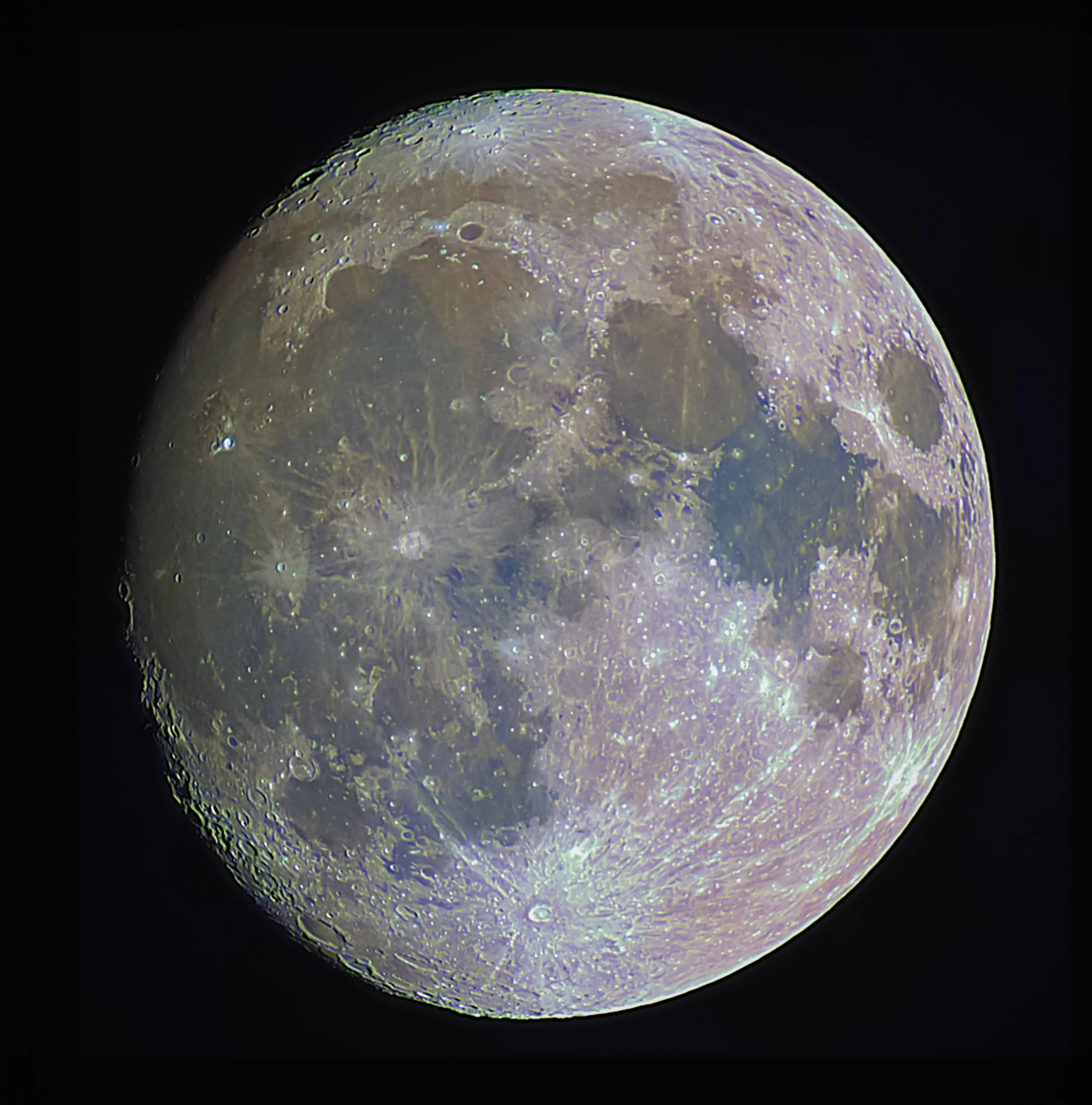 High-resolution DSLR astrophotography of the waxing gibbous moon showing the lunar terminator, the Apennine Mountains, and Copernicus crater.