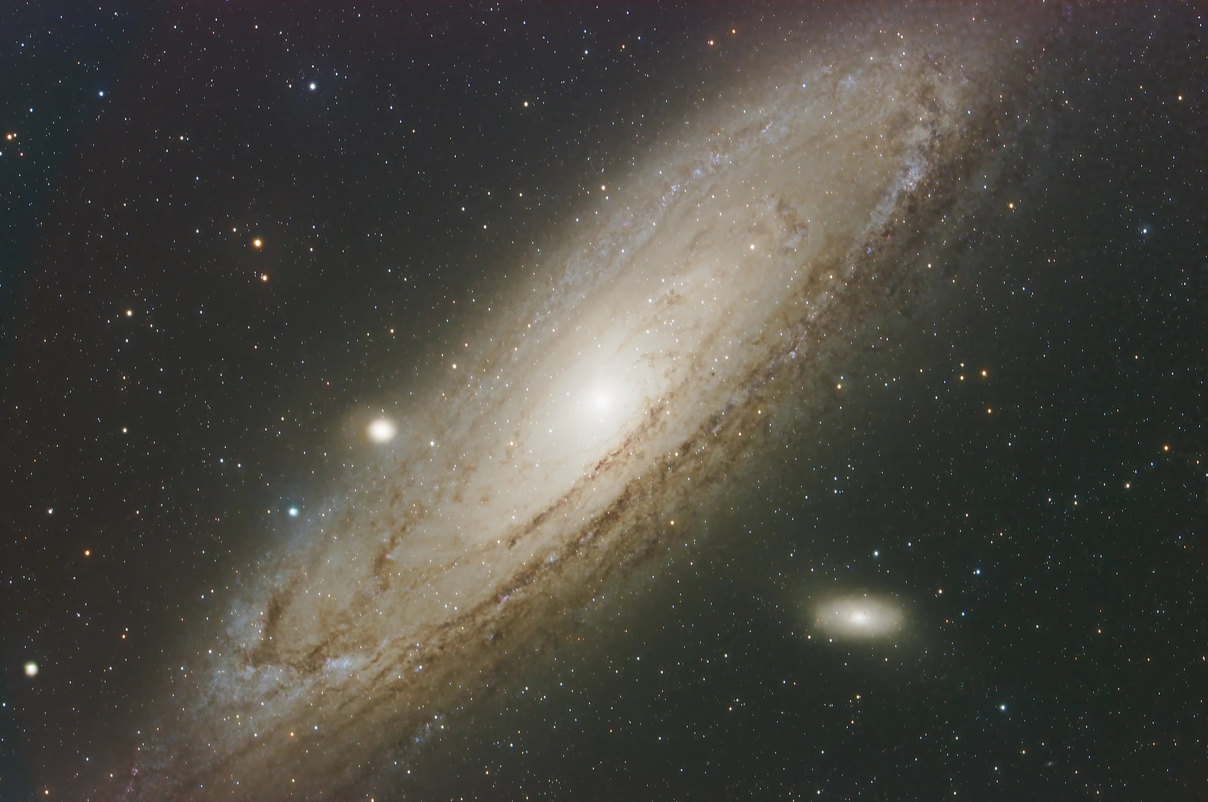 The Andromeda Galaxy (M31) and its satellite galaxies M32 and M110.