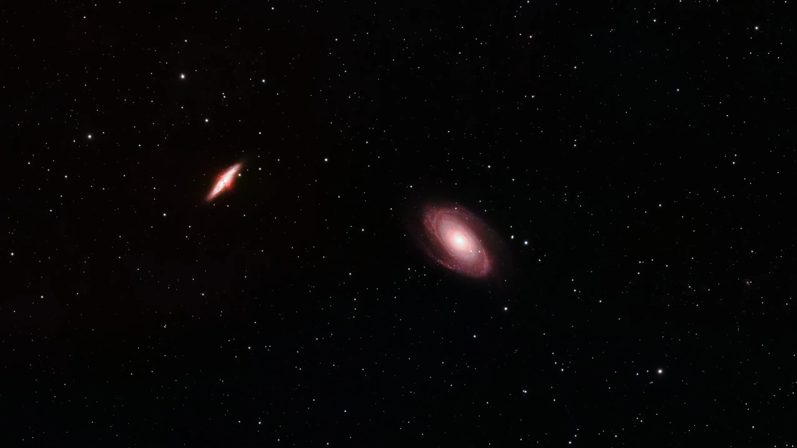 Bode's Galaxy (M81) and the Cigar Galaxy (M82) interacting in Ursa Major.