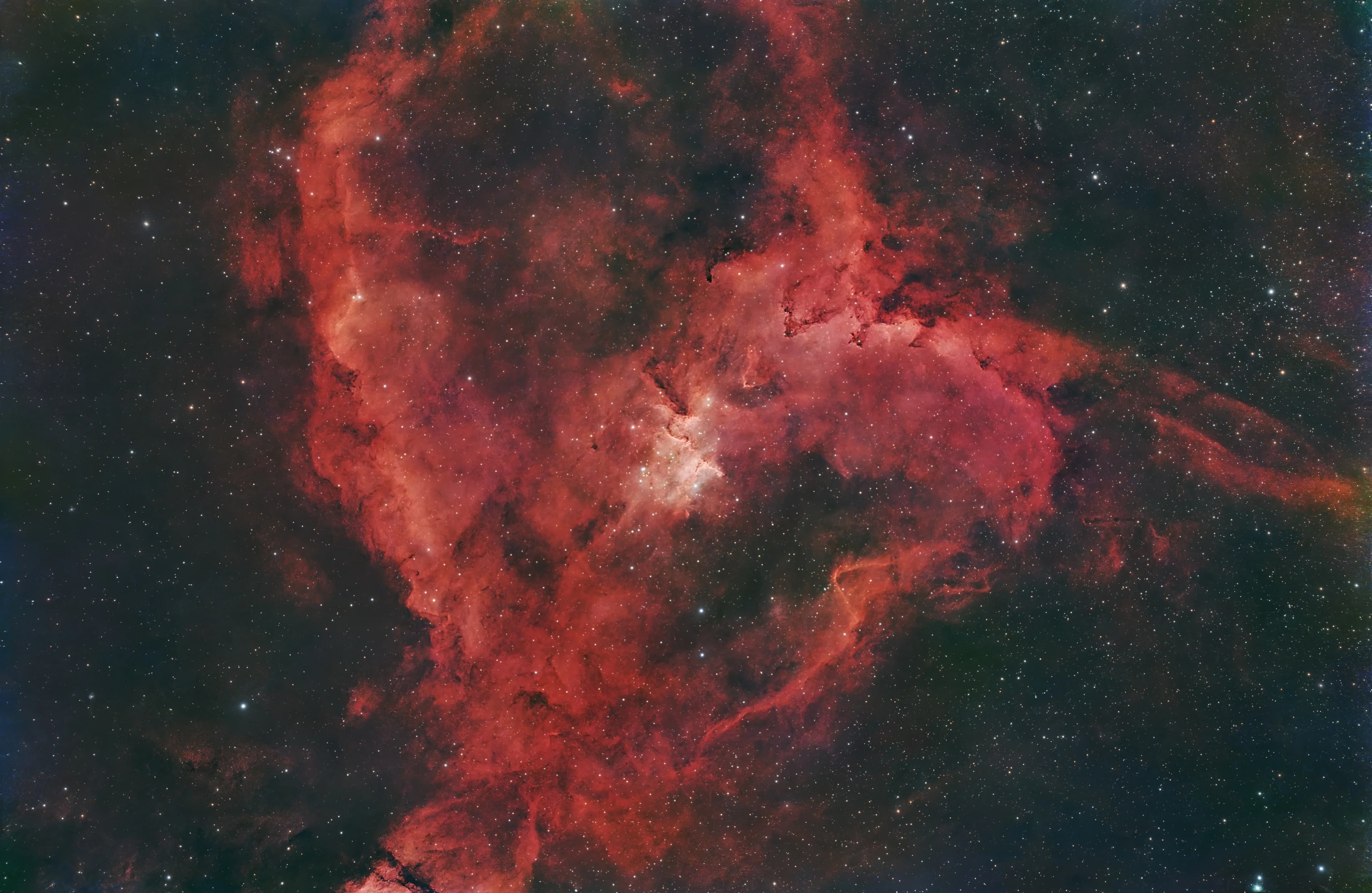 The Heart Nebula (IC 1805) emission complex captured in deep red narrowband hydrogen-alpha light.