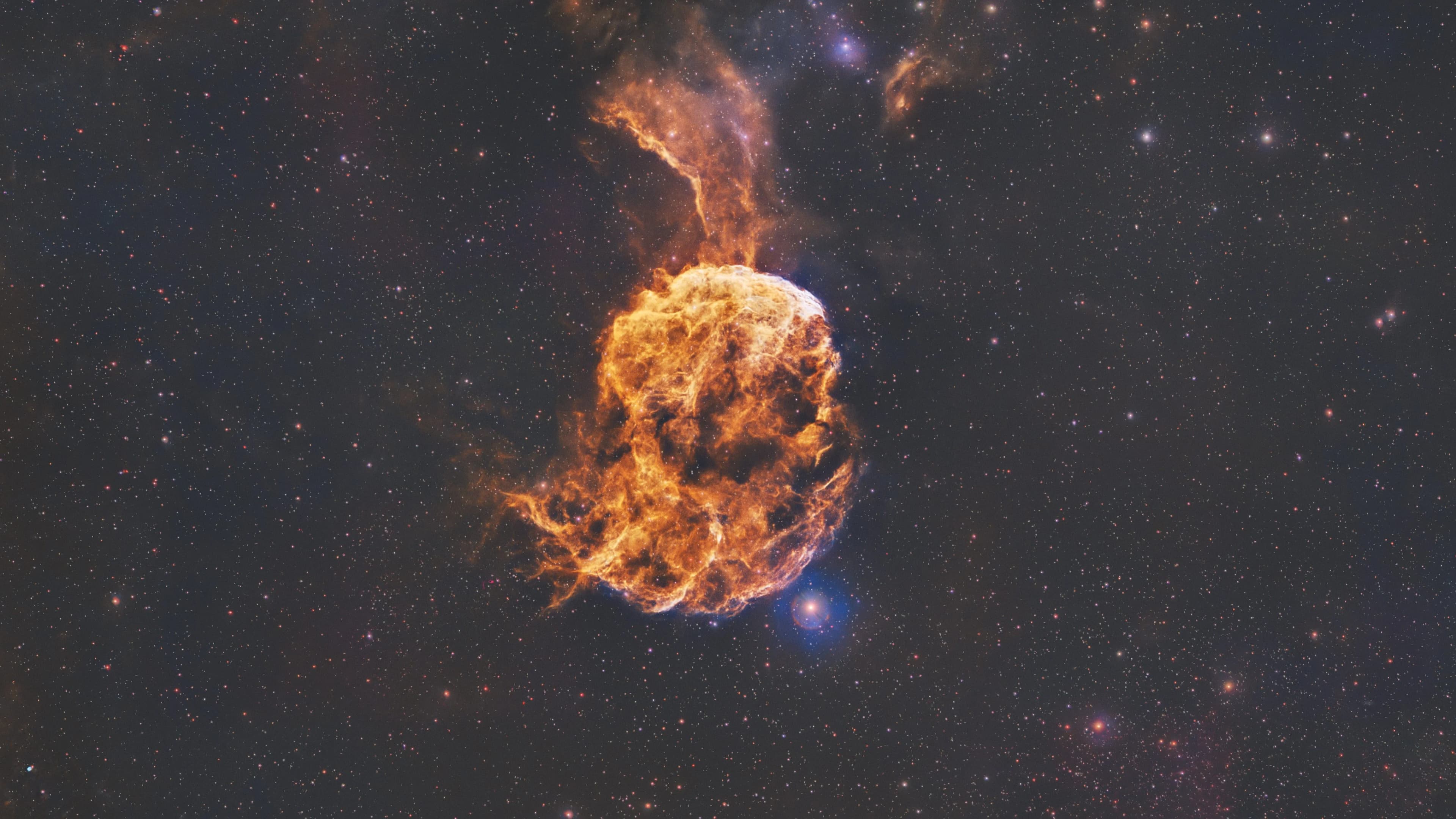 The Jellyfish Nebula (IC 443) supernova remnant mapped in the Hubble SHO palette.