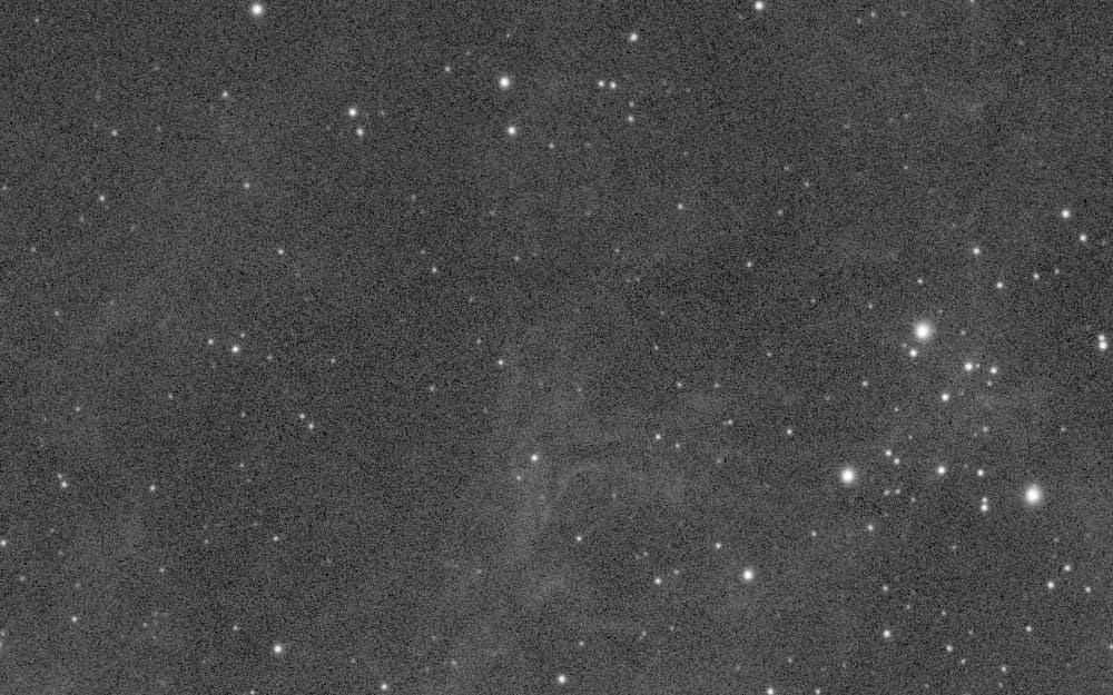 1:1 crop of the hydrogen-alpha master of the Jellyfish Nebula (IC 443), with faint filaments lost in noise