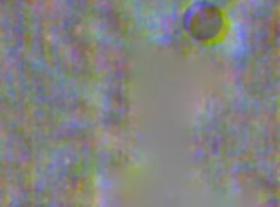 Background model of the uncalibrated RGB data for IC 443, showing a circular dust shadow near the top-right corner