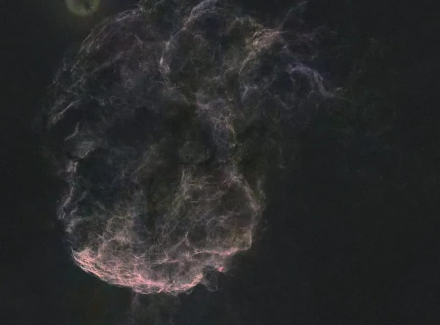 IC 443 coloured from 20 minutes of RGB per channel with forced saturation, showing magenta and olive colour noise